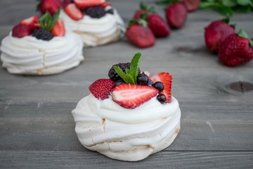 Pavlova dessert with fresh berrries