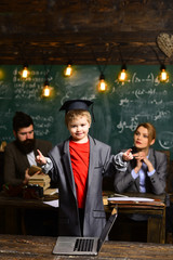 Teaching someone else is the best way to learn. Bearded man is tutor or teacher. Teacher or tutor helps preschool child. conference. Academic success is much more about hard work than inborn talent.