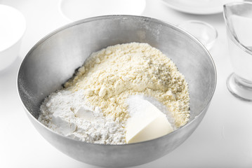 Ready-made Mexican corn tortilla: corn flour, wheat flour and butter mix in a bowl until crumbly