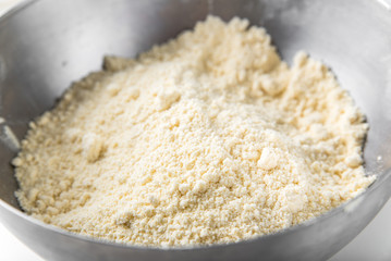 Ready-made Mexican corn tortilla: corn flour, wheat flour and butter mix in a bowl until crumbly.