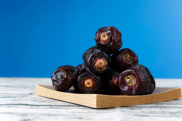 The dates on a wooden surface and blue background