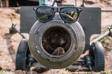 sunglasses on the artillery gun spring day