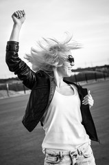 Beautiful girl with glasses posing and smiling