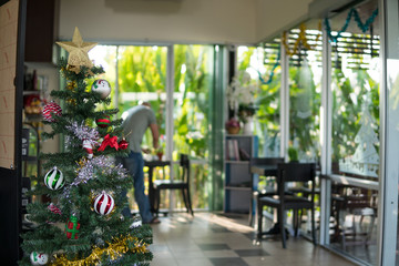 Decorated Christmas tree on blurred