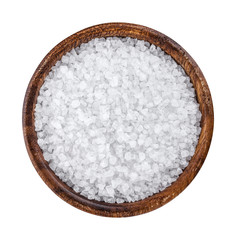 Sea salt in wooden bowl top view