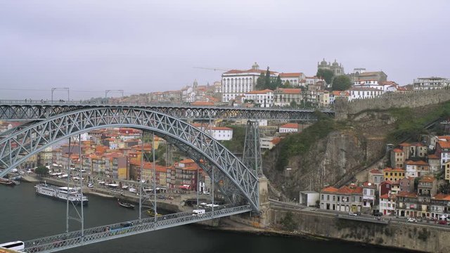 Aerial view of beautiful steel bridge Ponte Dom Luis I over the river Douro in Oporto, Portugal.