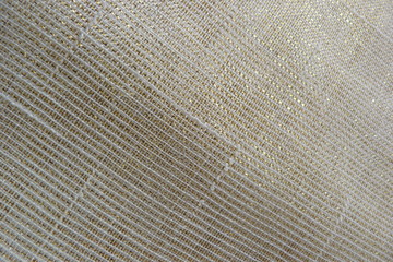 gold fabric brocade organza silk beige brown lurex fabric structure closeup background backdrop natural material antique vintage upholstery curtains textile decor weave yarn canvas