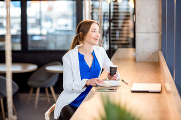 Business woman in the cafe