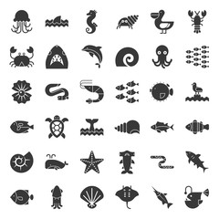 Aquatic Ocean life such as octopus, shell, pelican,herd of fish, solid icon set © lukpedclub