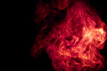 Red smoke on black background