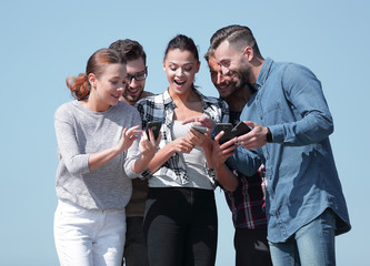 closeup. the group of students using smartphones.