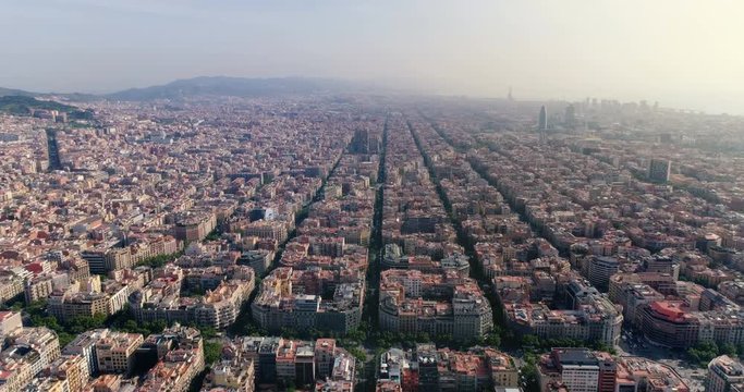 Aerial view of Barcelona skyline with morning light, Spain. Cityscape with typical urban blocks