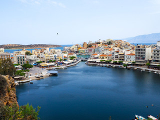 Fototapeta na wymiar Agios Nikolaos, Crete island, Greece the Voulismeni lake, a picturesque town in the eastern part of the island Crete with colorful buildings, Lasithi