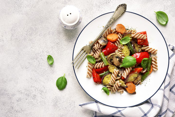 Whole grain pasta with mushrooms and vegetables.Top view.