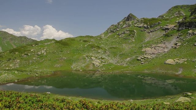 Alpine Panorama With Mountains And Lake