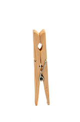 wooden clothes pegs isolated on the white