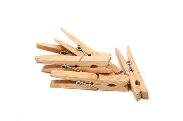 wooden clothes pegs isolated on the white