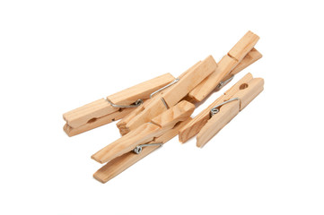wooden clothes pegs isolated on the white
