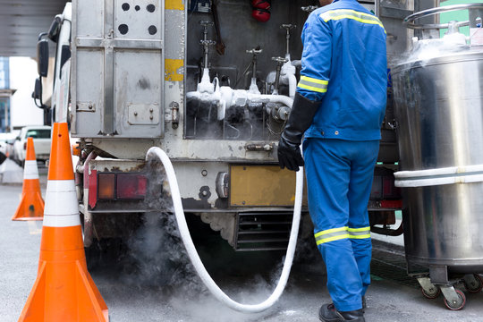 Technician Fill With Liquid Nitrogen With Nitrogen Storage Tank