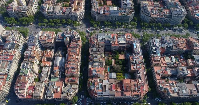 Aerial top shot of Barcelona street and block buildings, urban area, Spain