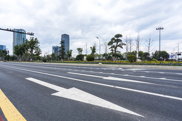 empty asphalt road with modern office building