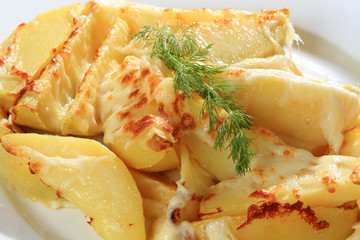 Closeup of potatoes with cheese