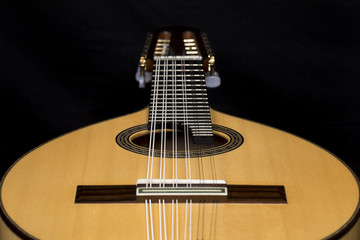 Lute on black background. Lute, mandolin, bandurria.