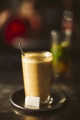 Coffee in a glass on a terrace in Tetouan, Morocco.