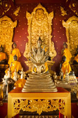 CHIANG MAI , THAILAND - 19 FEBUARY 2018 : beautiful gold buddha statue of Wat Chedi Ngam at VIANG Sub District, FANG District, CHIANG MAI Province in THAILAND
