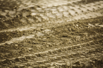 Wheel track on earth. Mining truck.
