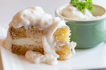 Coconut cake and ice cream.