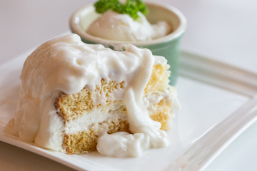 Coconut cake and ice cream.