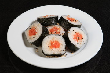 sushi over black background