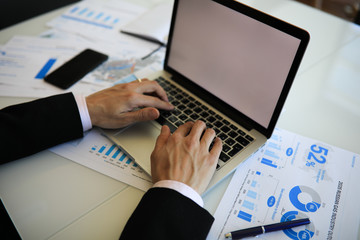 Businessman's hands typing on the computer