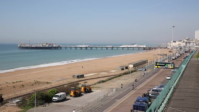 Brighton England seafront busy in beautiful weather with i360 tower in background England UK
