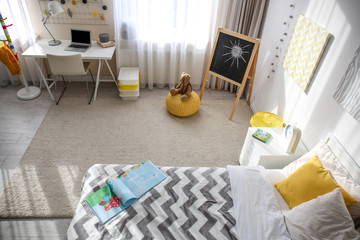 Child's bedroom interior with soft carpet