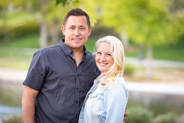 Fototapeta premium Young Caucasian Couple Portrait In The Park