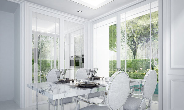 The luxury white dining room interior design and green garden background