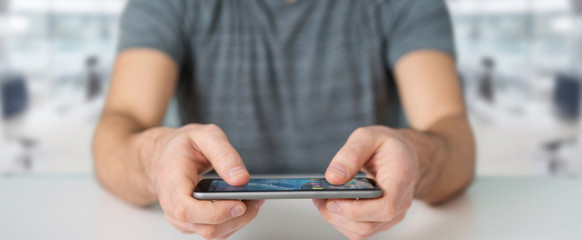 Businessman using modern mobile phone