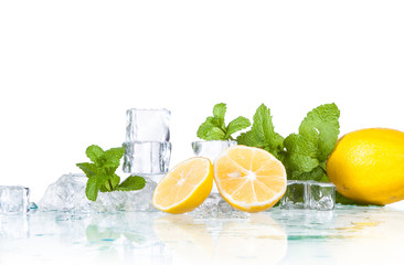 ice cubes, mint leaves with lemons isolated on a white background