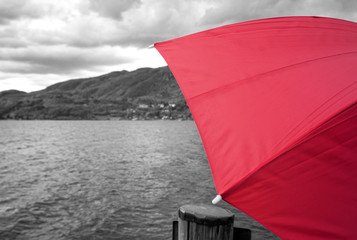 Red umbrella. Black and white photo