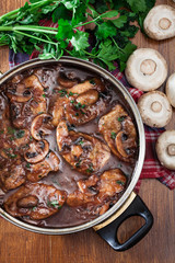 Delicious chicken marsala on frying pan