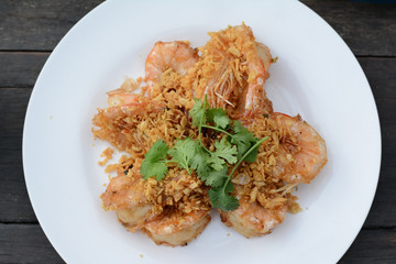 close up fried shrimp with garlic and green vegetacle