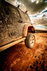 All-terrain vehicle leaving a wheel in the air. © cineuno