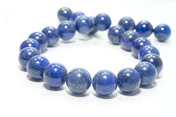 lapis lazuli bracelet isolated on white background.