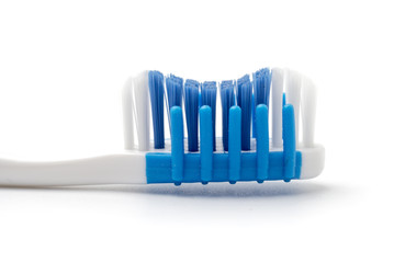 New toothbrush on a white background.