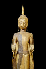 Ancient Buddha statue made of wood and covered with lacquer and gold leaves, Built in early Rattanakosin era.