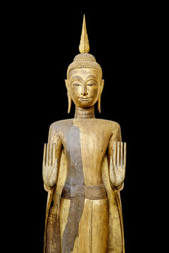 Ancient Buddha statue made of wood and covered with lacquer and gold leaves, Built in early Rattanakosin era.
