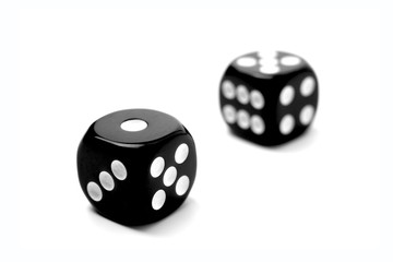 Two Black Dice Games isolated on a white background.