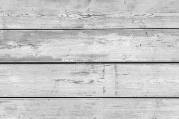 Wall from wooden horizontal boards close-up. Wood texture. Black and whit image.